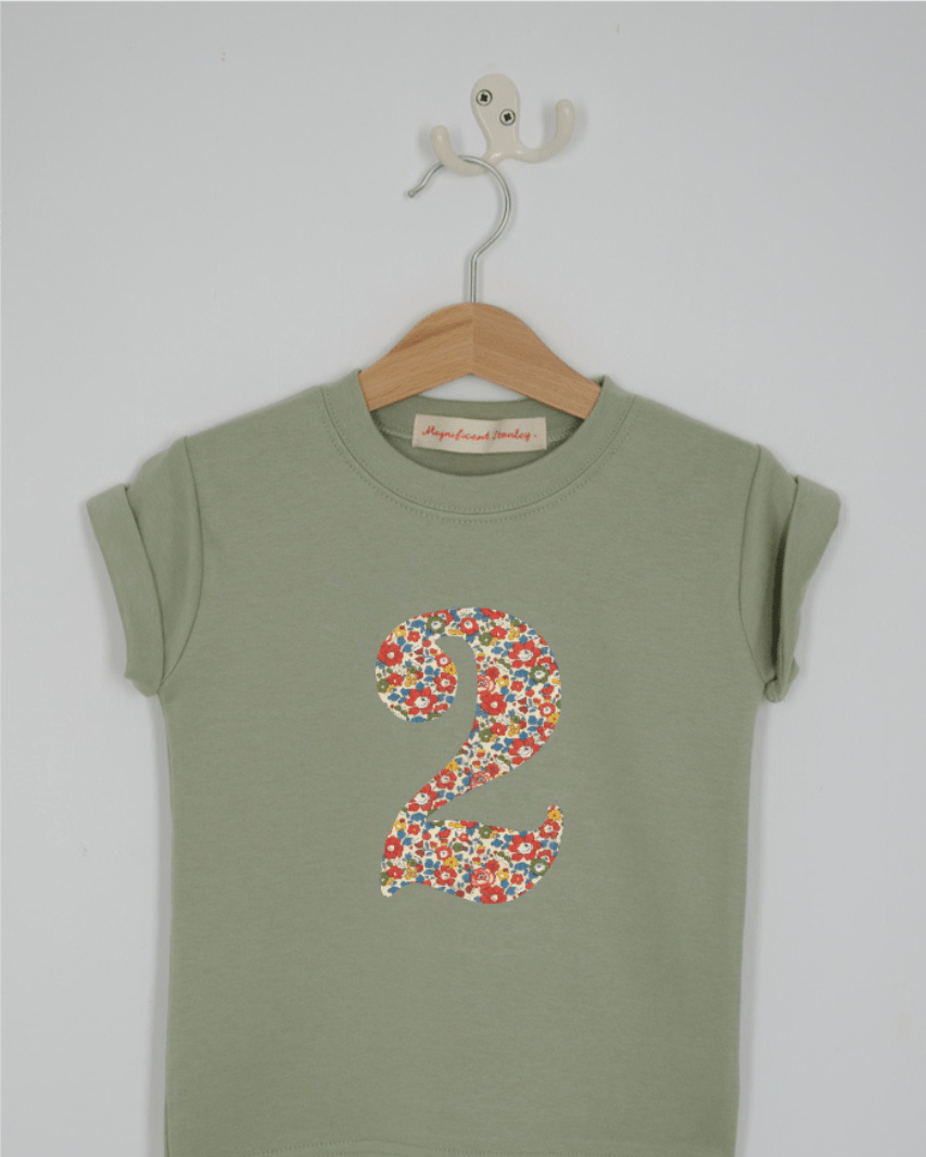 a number 2nd birthday kids sage green t-shirt with a number cut from Betsy Ann floral liberty print on the front.