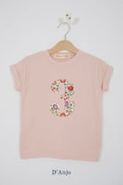 a pink birthday t-shirt with a number 3 cut from d'anjo liberty floral print on the front