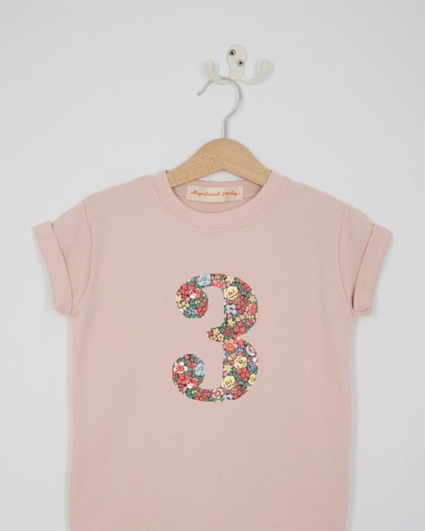 a pink 3rd birthday t-shirt with a number 3 cut from emma louise liberty floral print on the front