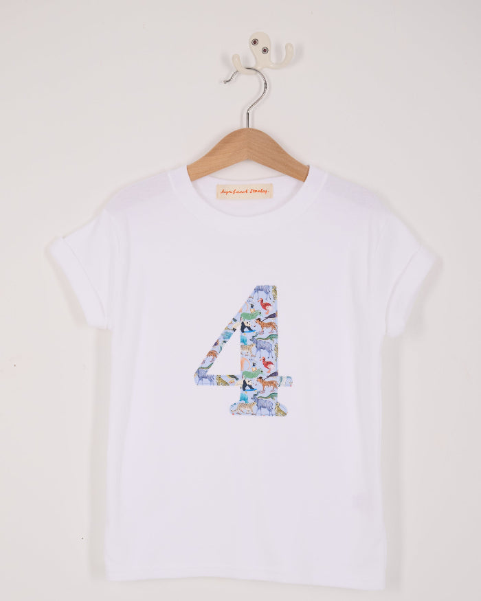 A white cotton t-shirt with the number 4 sewn on the front cut from liberty Quey 2 zoo animal print.