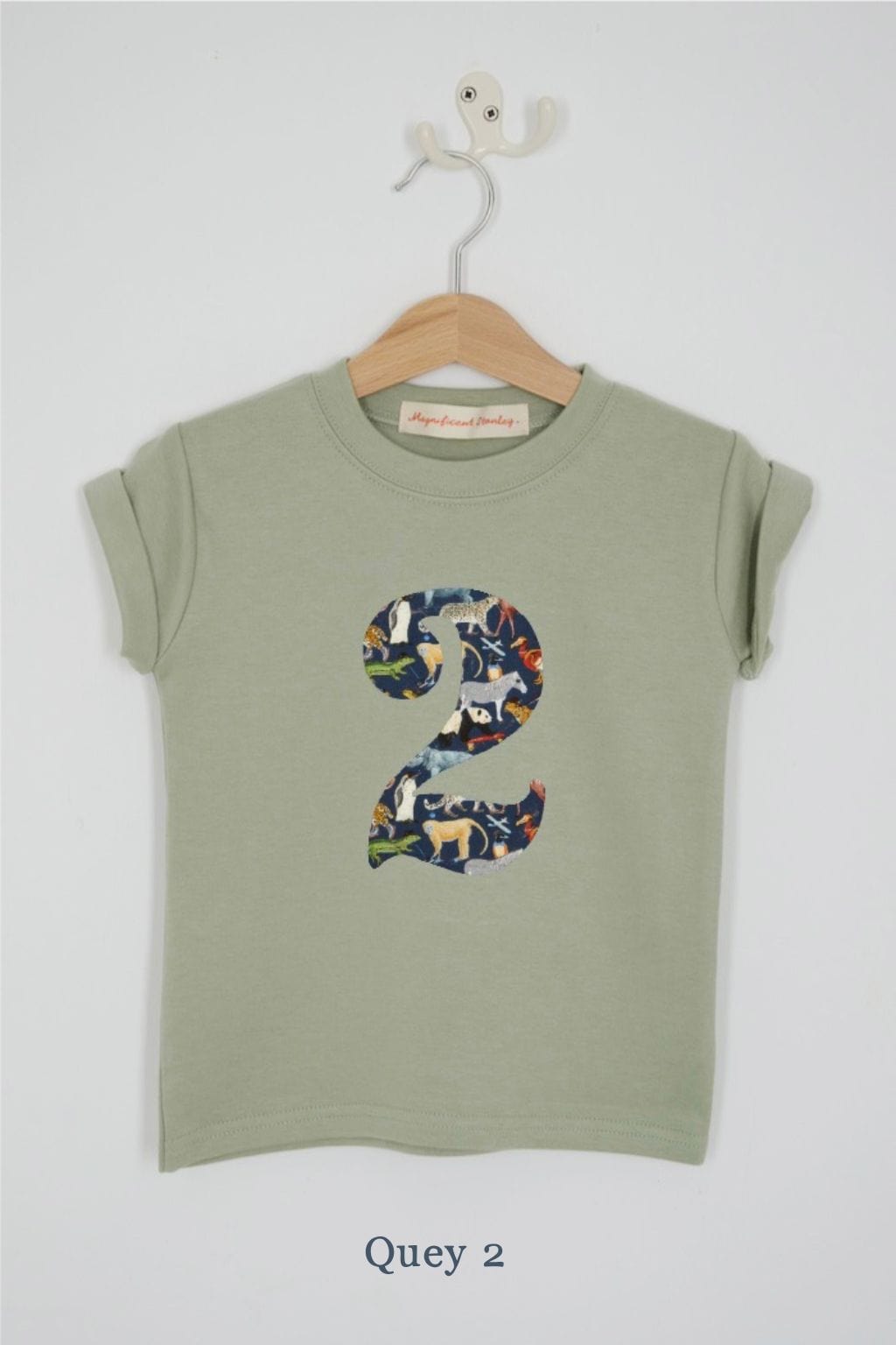 a number 2nd birthday kids sage green t-shirt with a number cut from quey 2 animal liberty print on the front.
