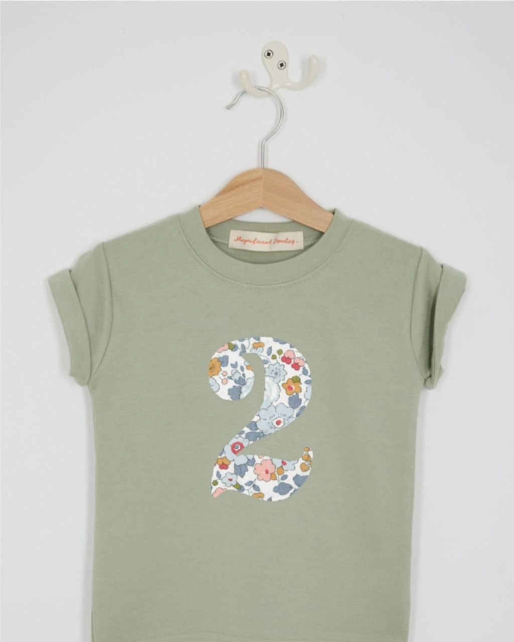 a birthday number 2 kids sage green t-shirt with a number cut from betsy grey floral liberty print on the front.