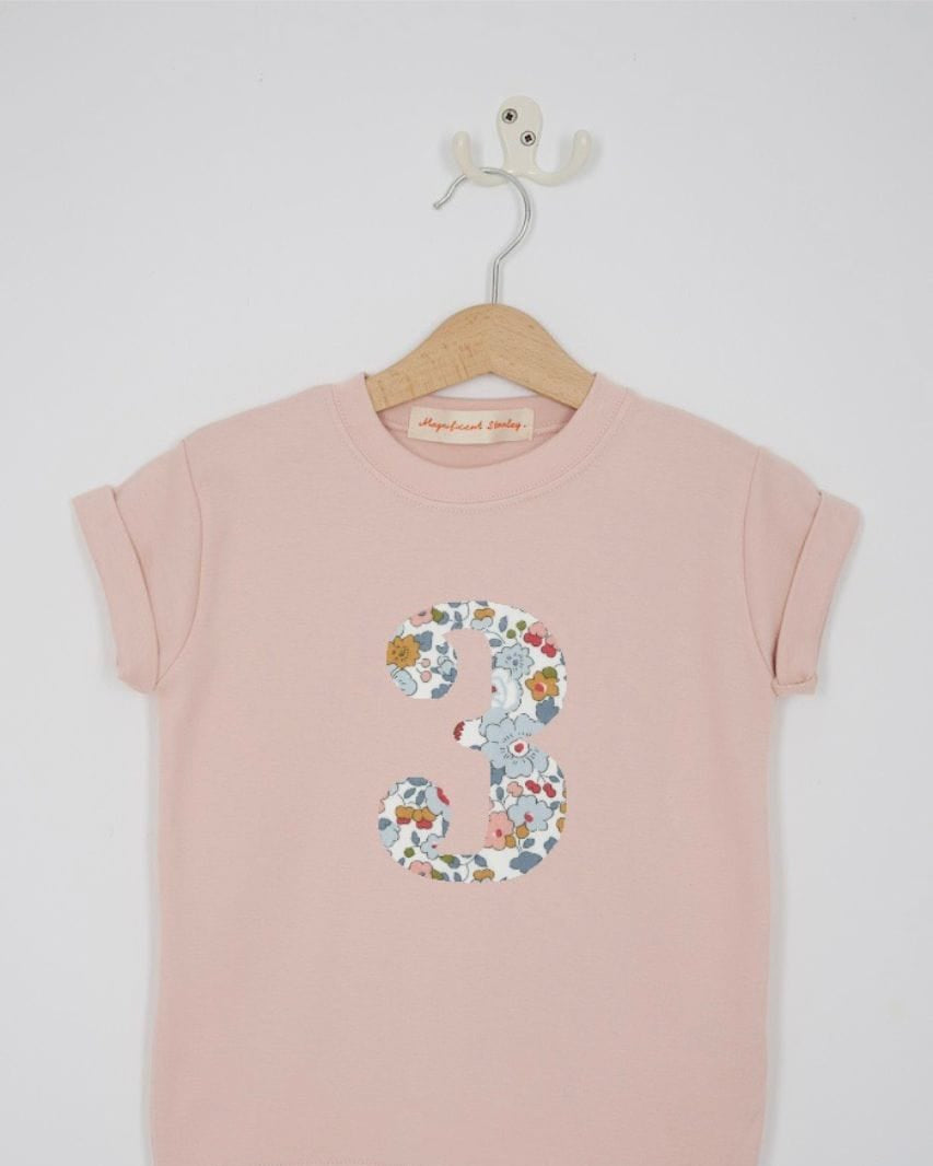 a pink 3rd birthday t-shirt with a number 3 cut from betsy grey liberty floral print on the front