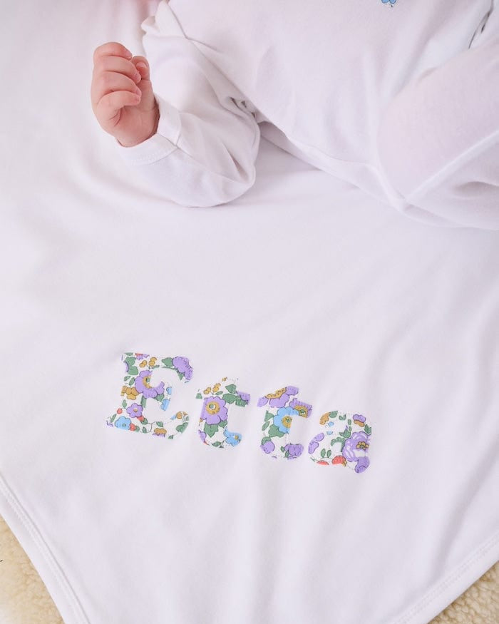 Personalised baby blanket new baby gift with name on in Betsy Purple liberty print.