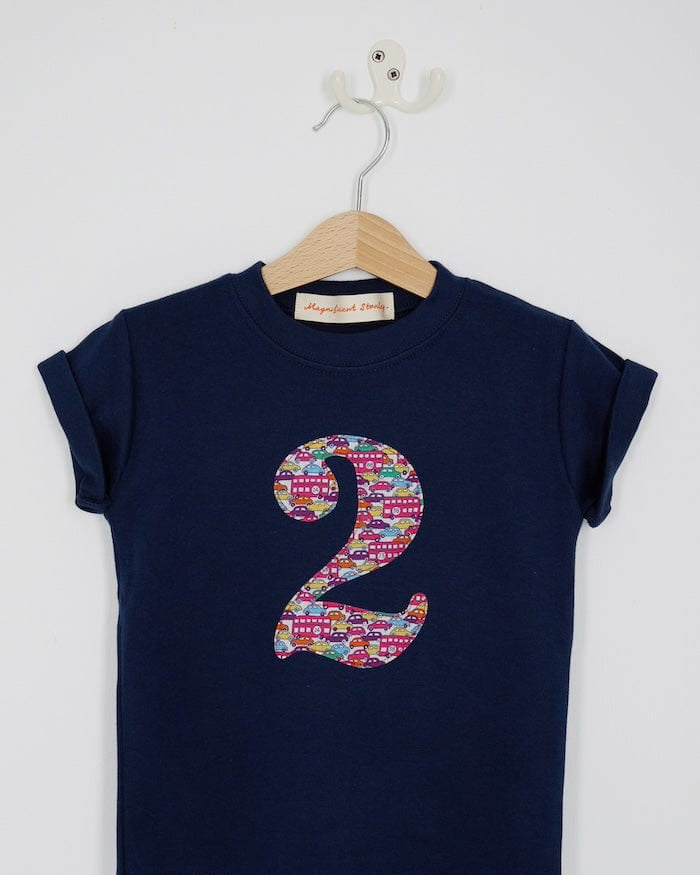 a navy cotton kids birthday t-shirt with the number 2 in a red Hop on hop off Liberty print.