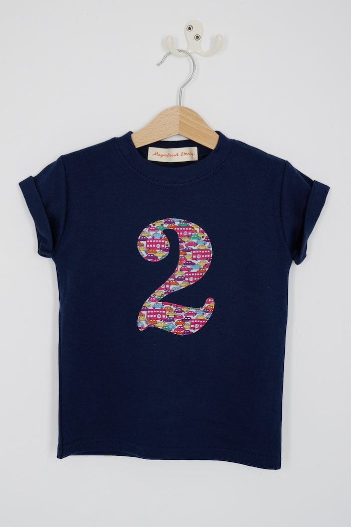 a navy cotton kids birthday t-shirt with the number 2 in a red Hop on hop off Liberty print.