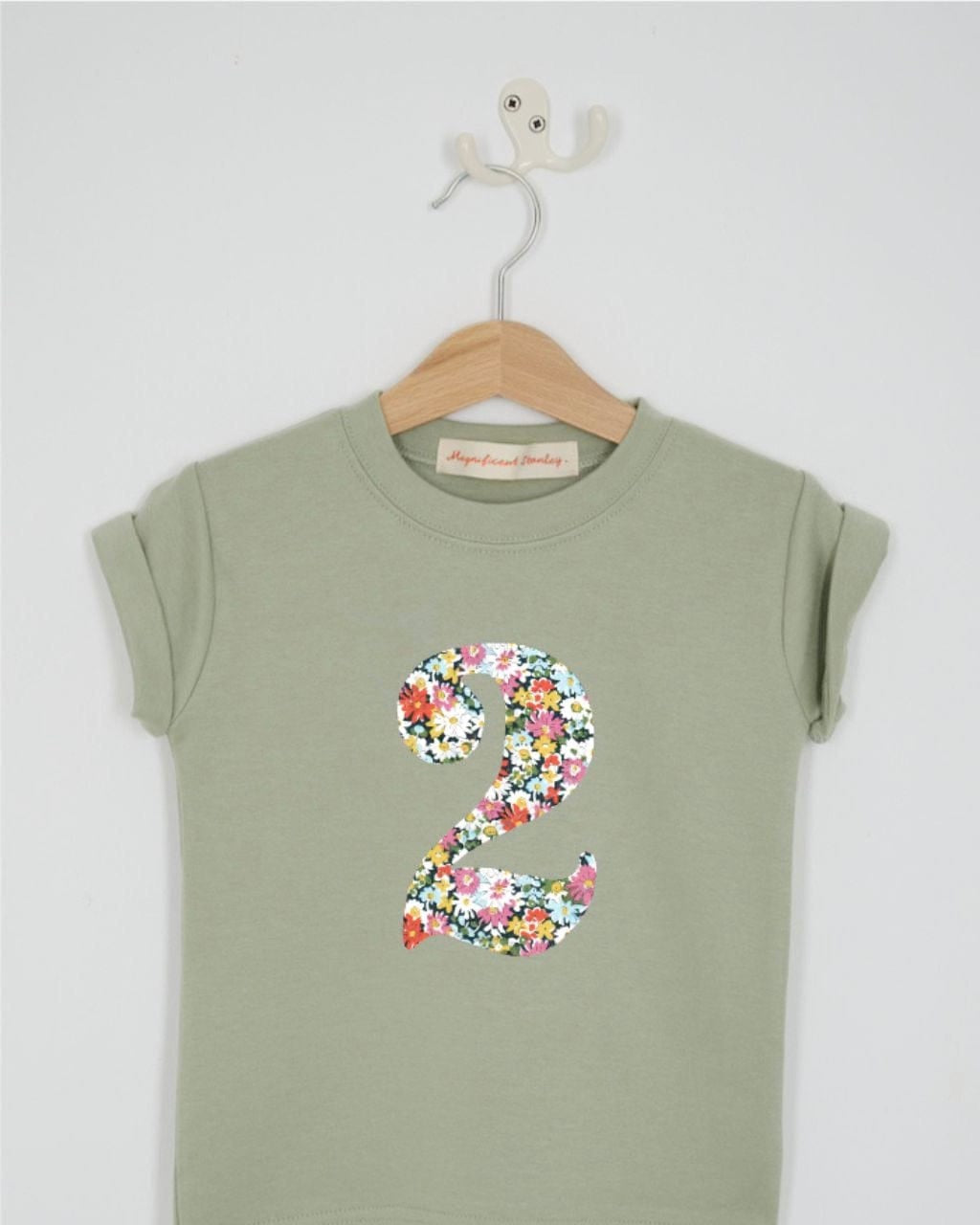 a number 2nd birthday kids sage green t-shirt with a number cut from libby floral liberty print on the front.