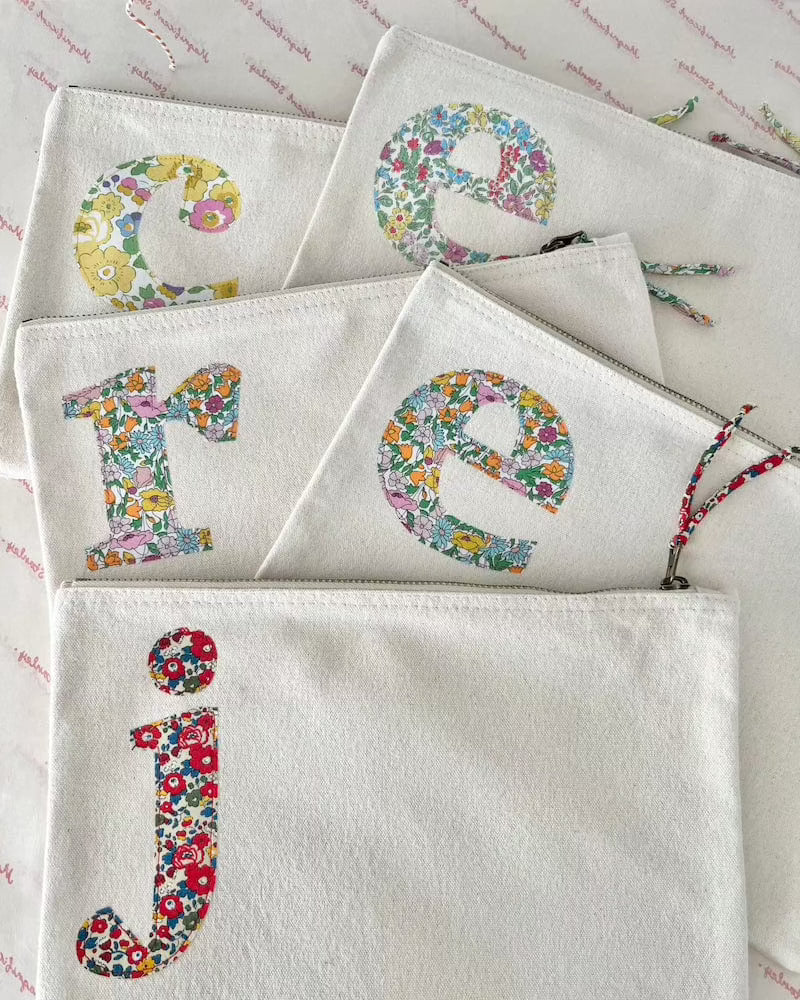Personalised Liberty print pouches with initials sewn on them. Teacher gifts for make up or stationery.