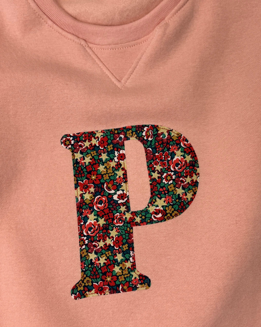 Liberty Floral letter appliqué 'P' on a pink sweatshirt dress