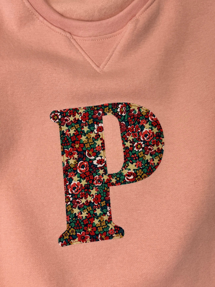 Liberty Floral letter appliqué 'P' on a pink sweatshirt dress