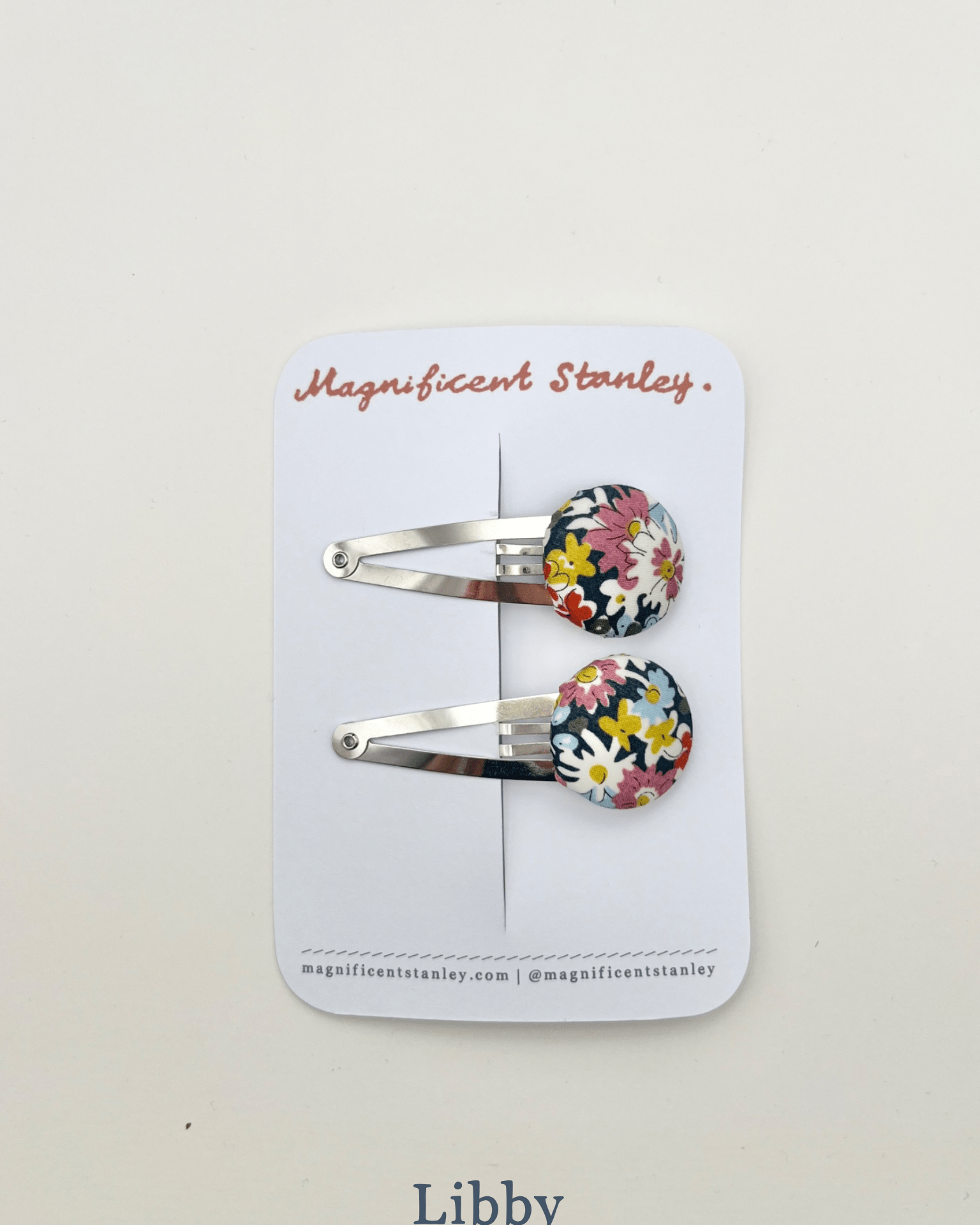 a pair of Magnificent Stanley libby Liberty Print Bobble Hair Clips