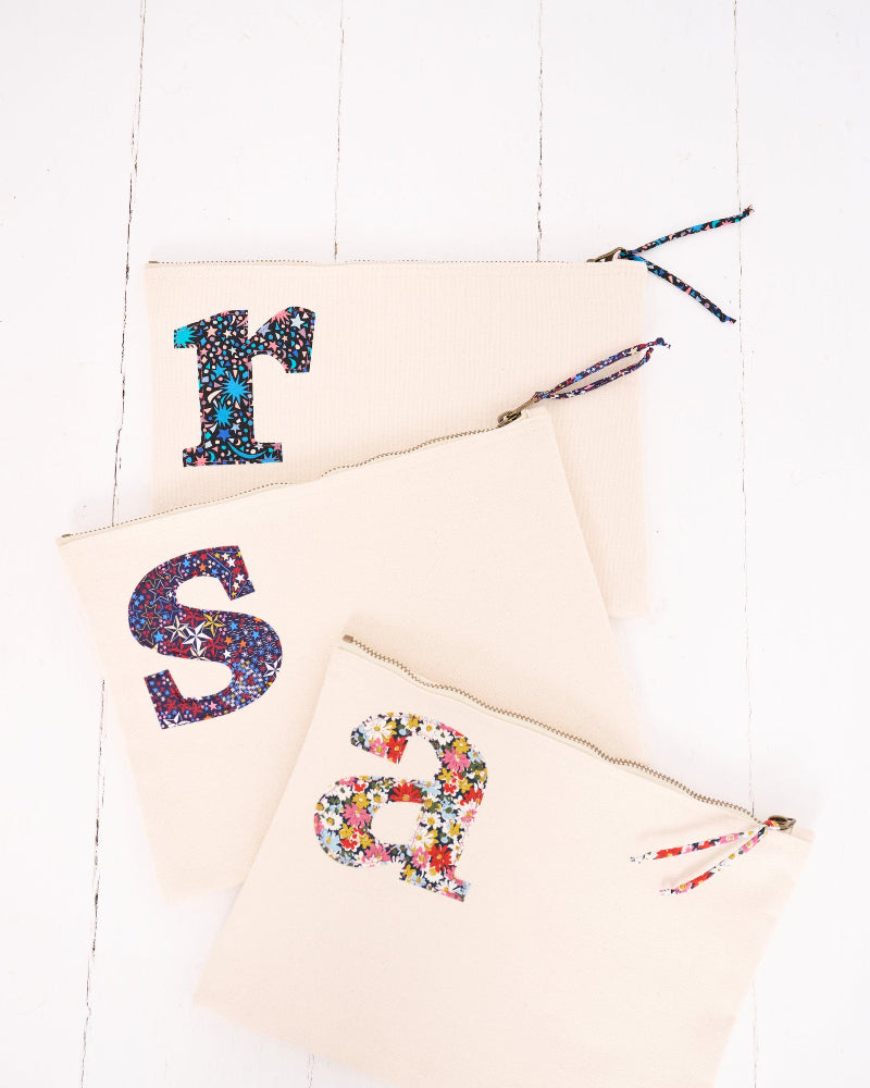 Magnificent Stanley Personalised Liberty print pouches with initials sewn on them. Teacher gifts for make up or stationery.