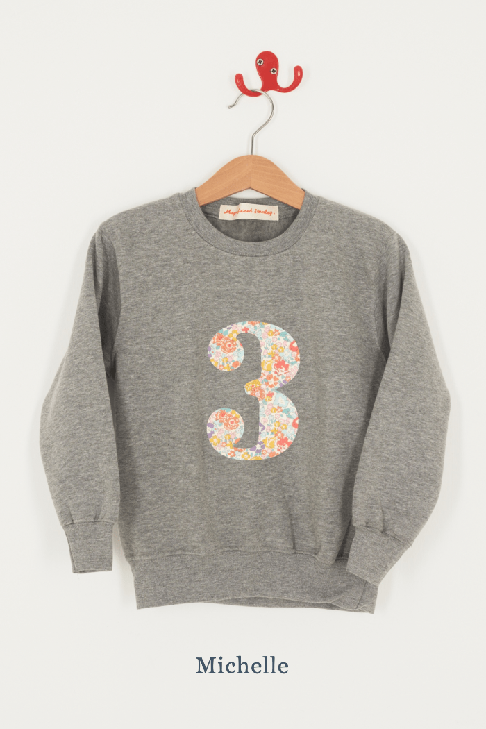 A birthday grey sweatshirt with a number 3 on in Michelle floral Liberty fabric.
