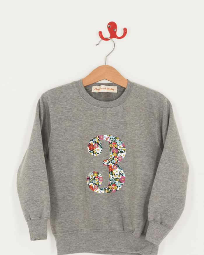 A birthday grey sweatshirt with a number 3 on in Libby floral Liberty fabric.