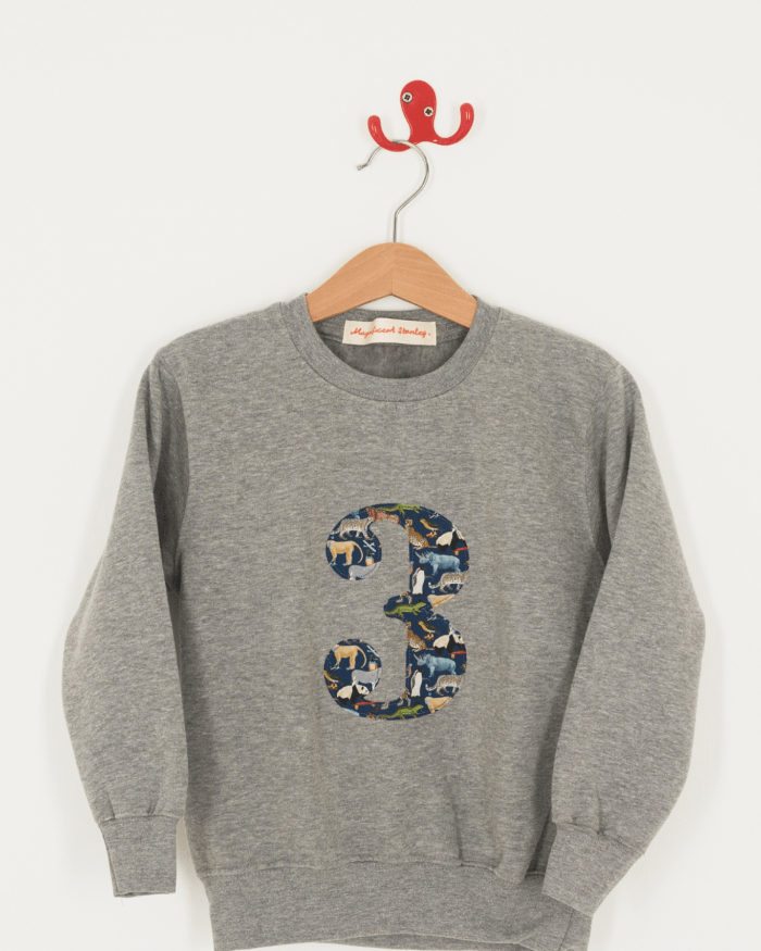 A birthday grey sweatshirt with a number 3 on in Quey zoo animal Liberty fabric.