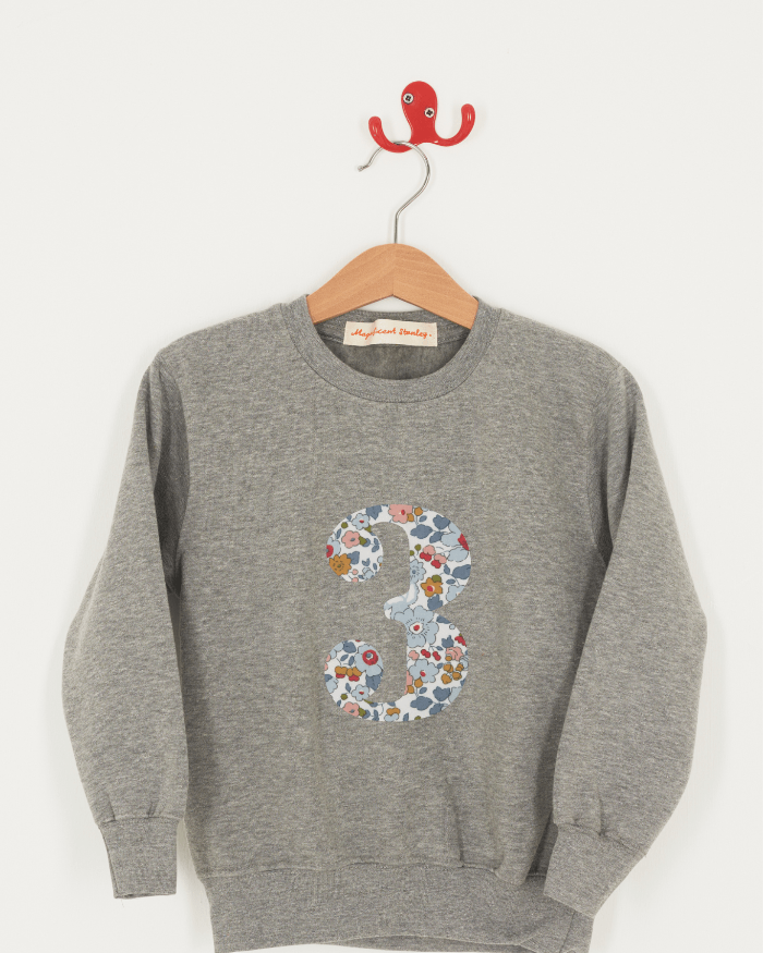 A birthday grey sweatshirt with a number 3 on in Betsy floral Liberty fabric.