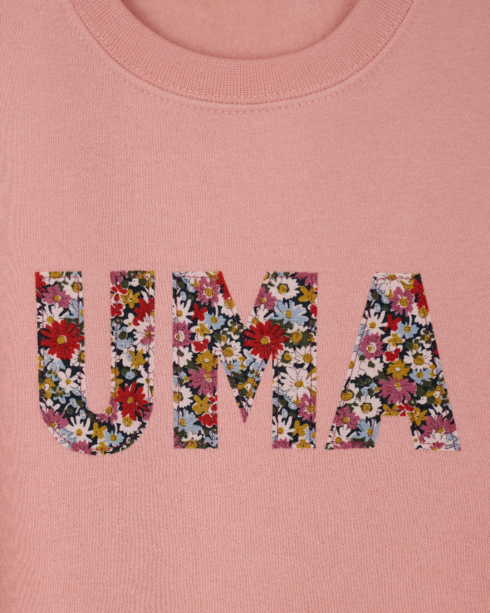 a Magnificent Stanley Dusty Pink Sweatshirt  with the name UMA sewn on in Libby floral Liberty Print