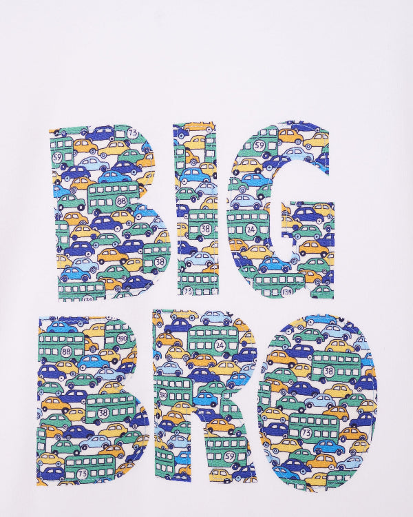 A close up of a white t-shirt with BIG BRO sewn onto it in vintage liberty cars print.