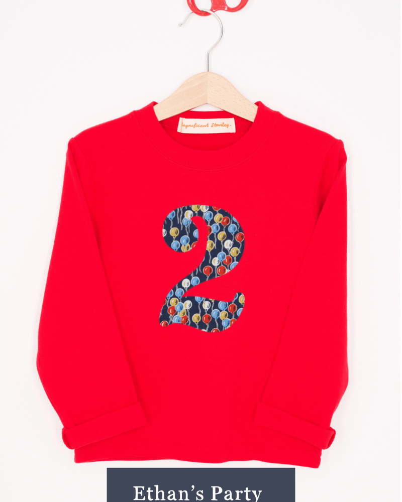 a Magnificent Stanley long sleeve Red birthday T-Shirt with the number 2 on the front in Ethan's party balloon Liberty Print