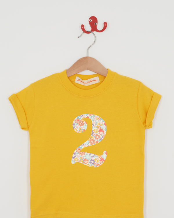 a yellow birthday t-shirt with a number 2 cut from Michelle liberty floral print on the front.
