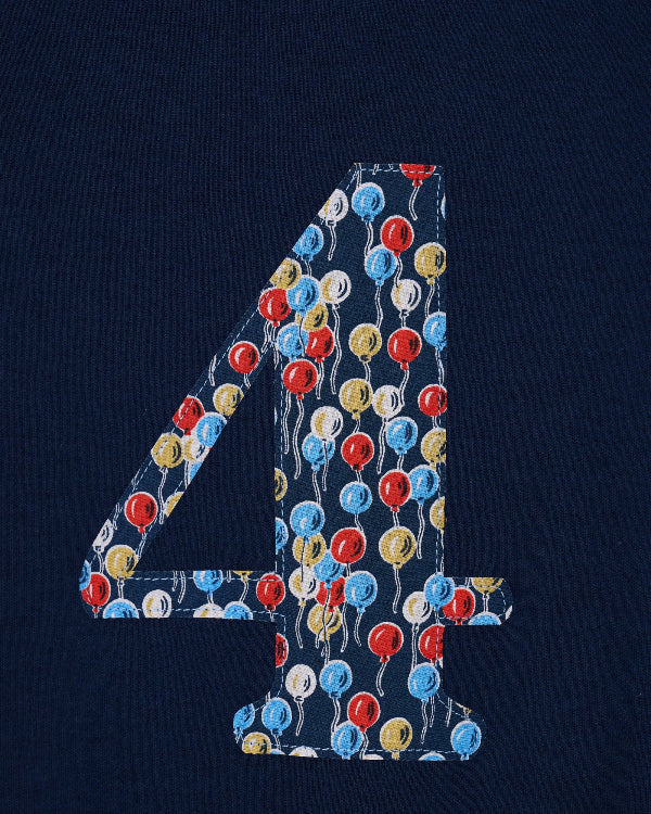 a close up of the stitching on a kids Number 4 cotton Navy birthday T-Shirt in Ethan's Party Liberty Print.