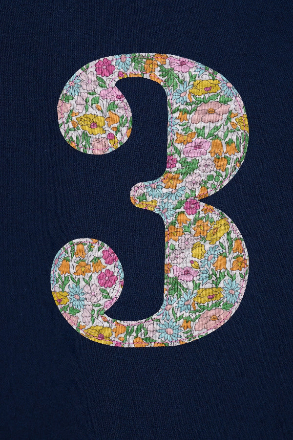 a Magnificent Stanley kids Number 3 Navy T-Shirt in Poppy Forest Liberty Print.