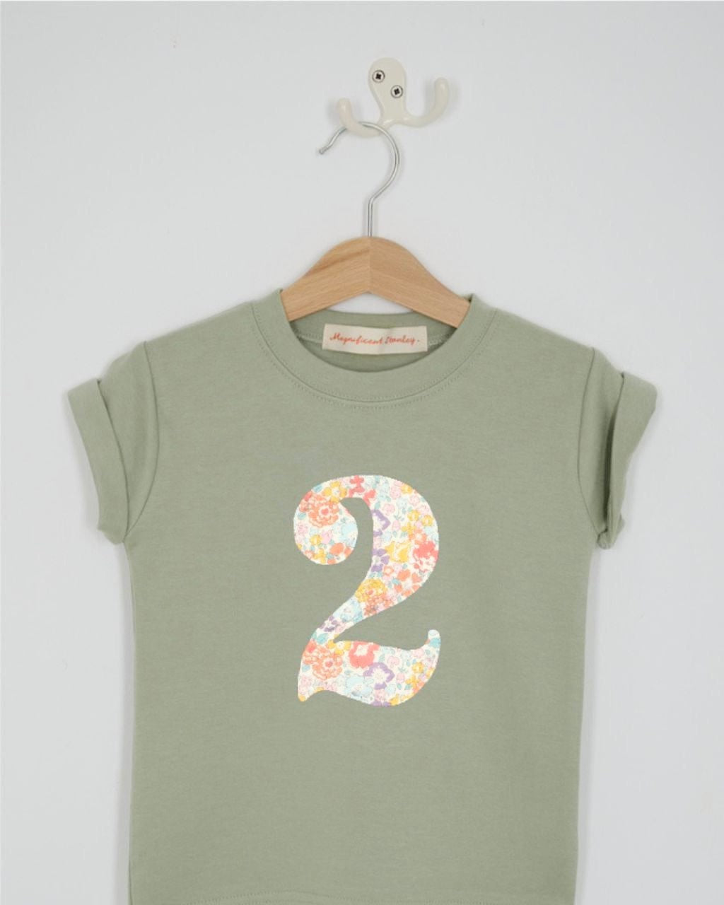 a number 2nd birthday kids sage green t-shirt with a number cut from Michelle floral liberty print on the front.