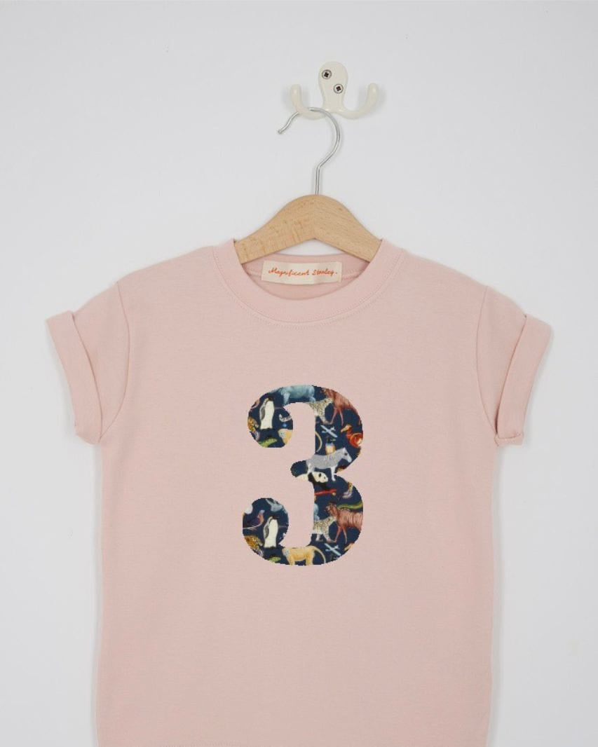 a pink 3rd birthday t-shirt with a number 3 cut from quey 2 liberty zoo animal print on the front