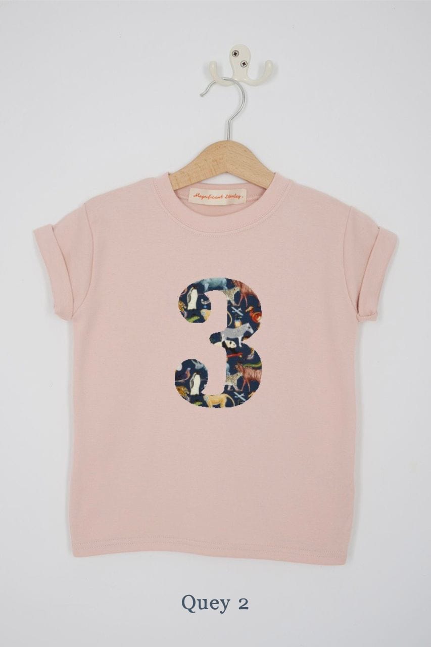 a pink 3rd birthday t-shirt with a number 3 cut from quey 2 liberty zoo animal print on the front