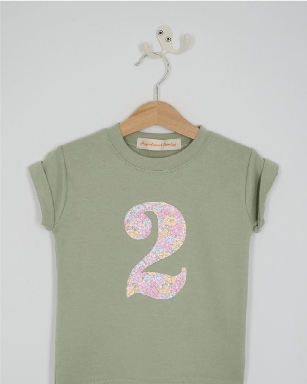 a number 2nd birthday kids sage green t-shirt with a number cut from sadie rose floral liberty print on the front.