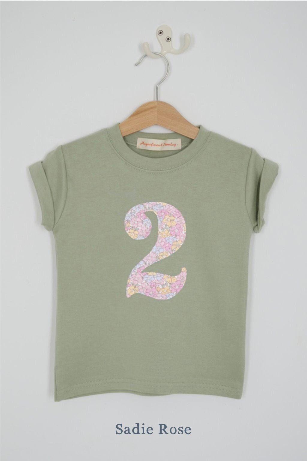 a number 2nd birthday kids sage green t-shirt with a number cut from sadie rose floral liberty print on the front.