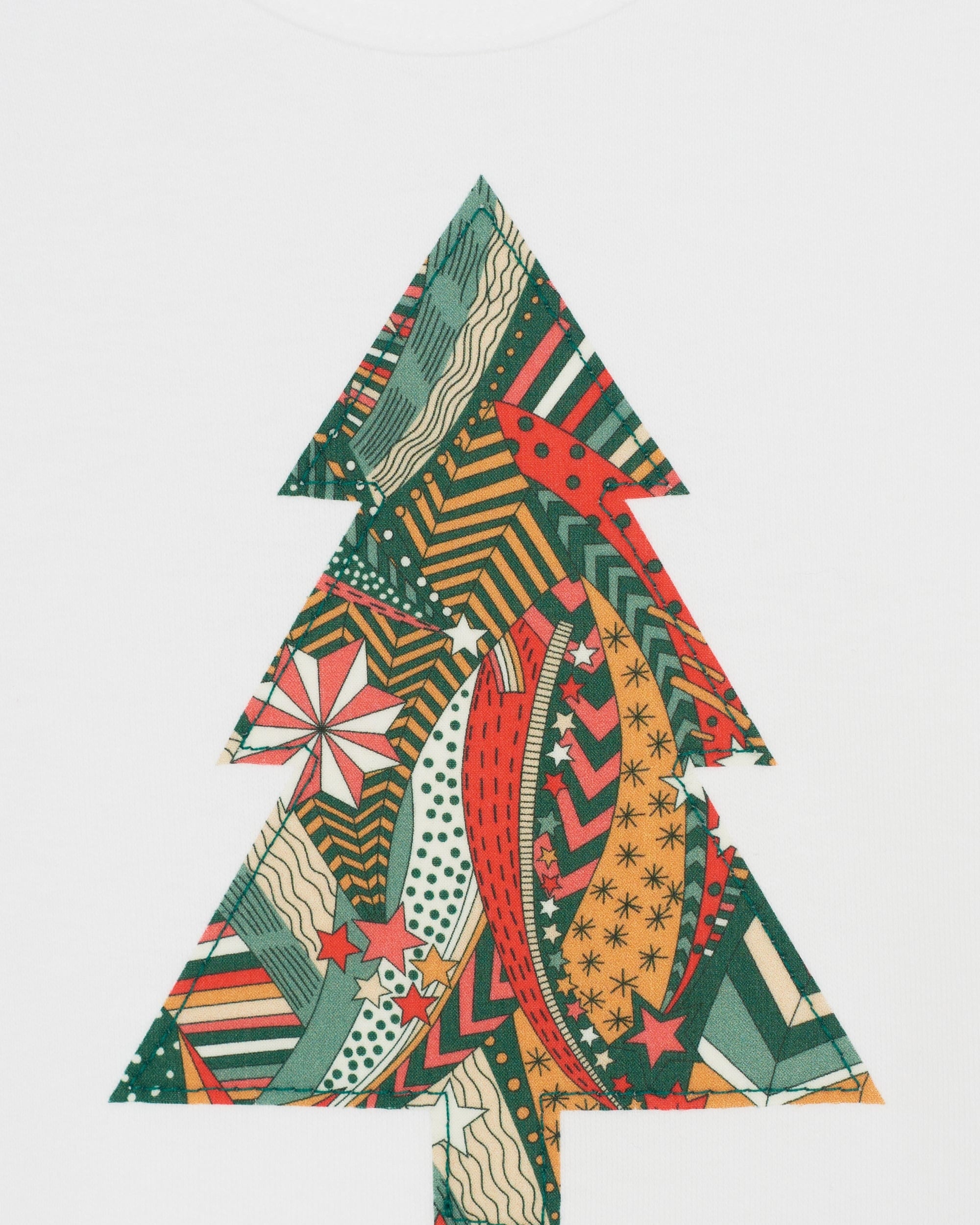 A white bodysuit babygrow with a Liberty My Little Star print festive Christmas tree sewn on the front.