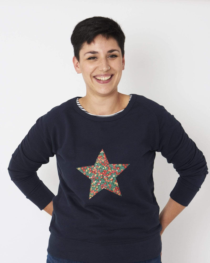 A Magnificent Stanley Ladies navy Christmas jumper with a festive Star in Wiltshire Liberty Print sewn on the front