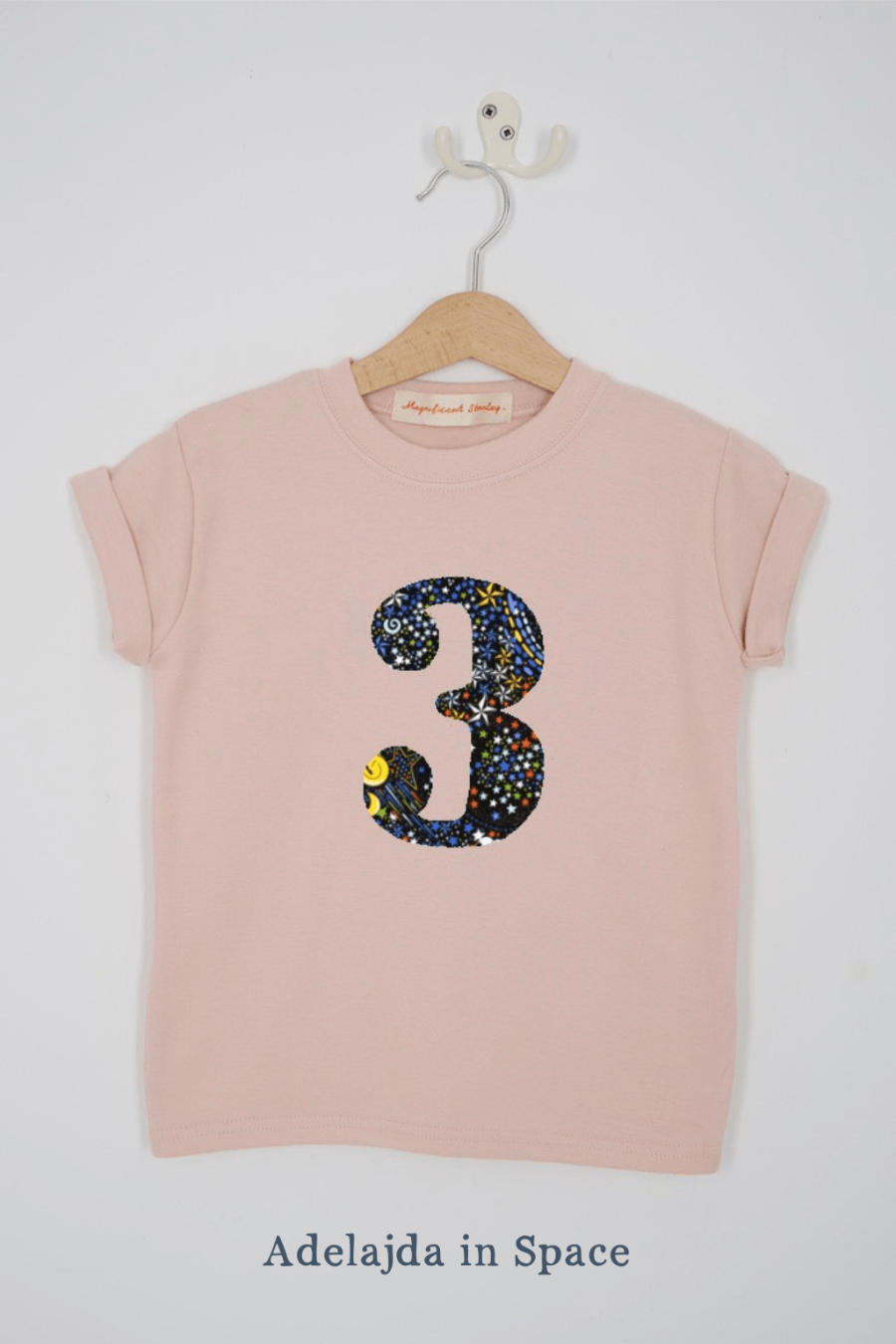 a pink 3rd birthday t-shirt with a number 3 cut from Adelajda Space liberty print on the front