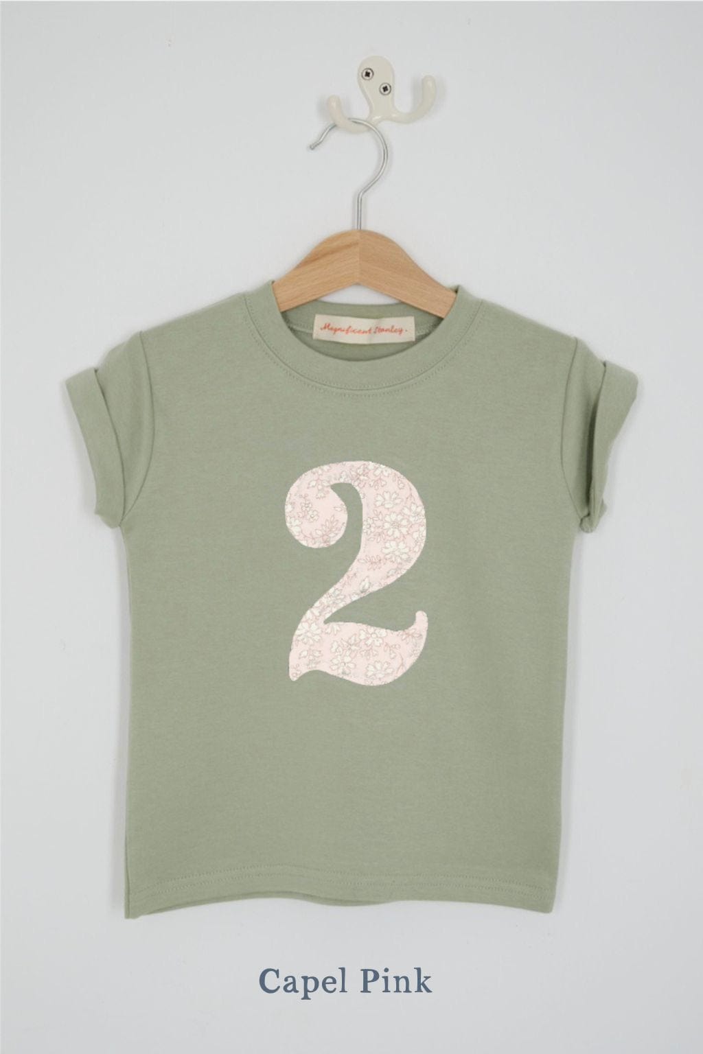 a birthday number 2 kids sage green t-shirt with a number cut from capel pink floral liberty print on the front.