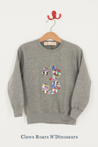 A birthday grey sweatshirt with a number 3 on in Dinosaurs Liberty fabric.