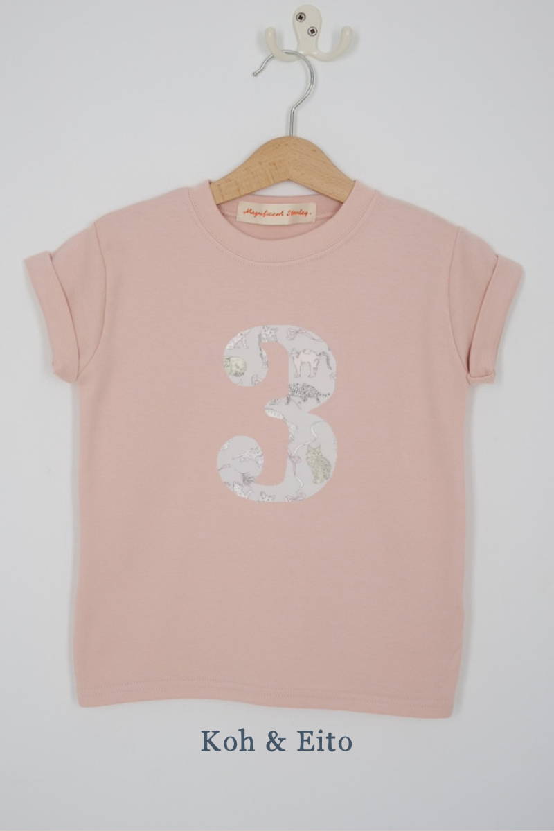 a pink 3rd birthday t-shirt with a number 3 cut from Koh & Eito liberty cat print on the front