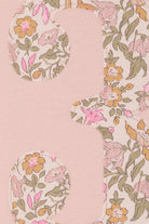 a pale pink t-shirt with the number 3 sewn on the front cut from liberty floral Mamie print. a close up of the applique stitching