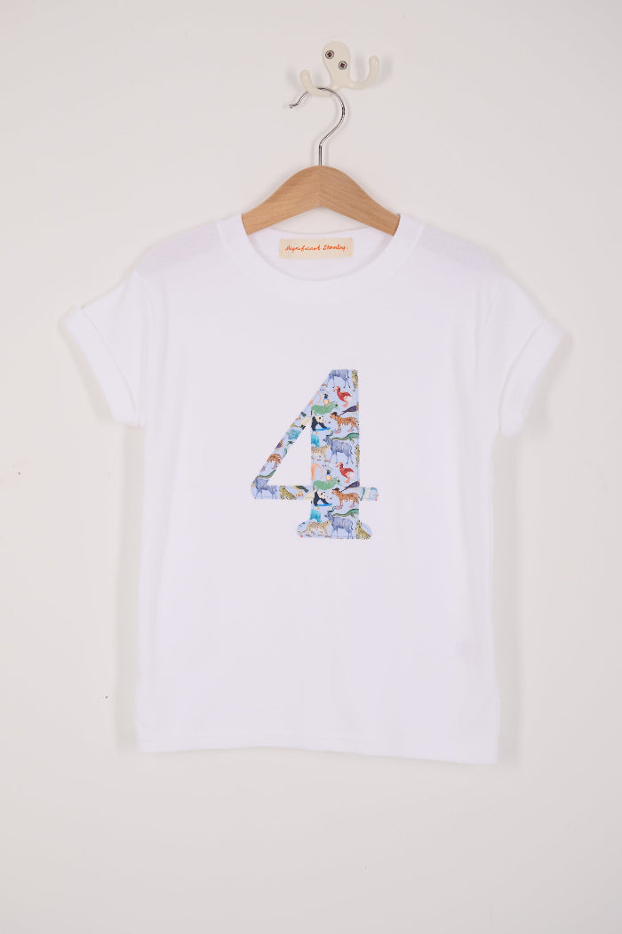 A white cotton t-shirt with the number 4 sewn on the front cut from liberty Quey 2 zoo animal print.