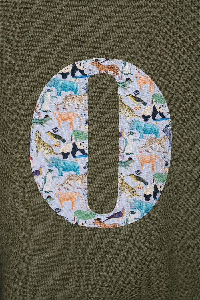 a personalised khaki sweater with a large letter 'O' in Quey 2 liberty animal print.
