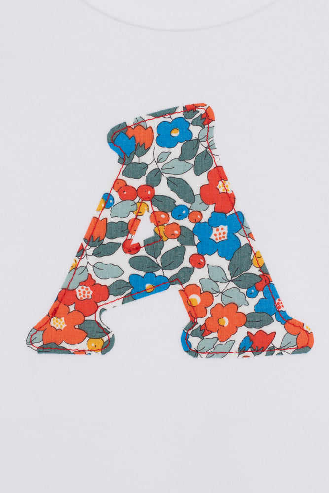 Floral-patterned letter 'A' on a white background