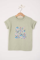  a 'Big Bro' green t-shirt with animal-themed letters on a plain background