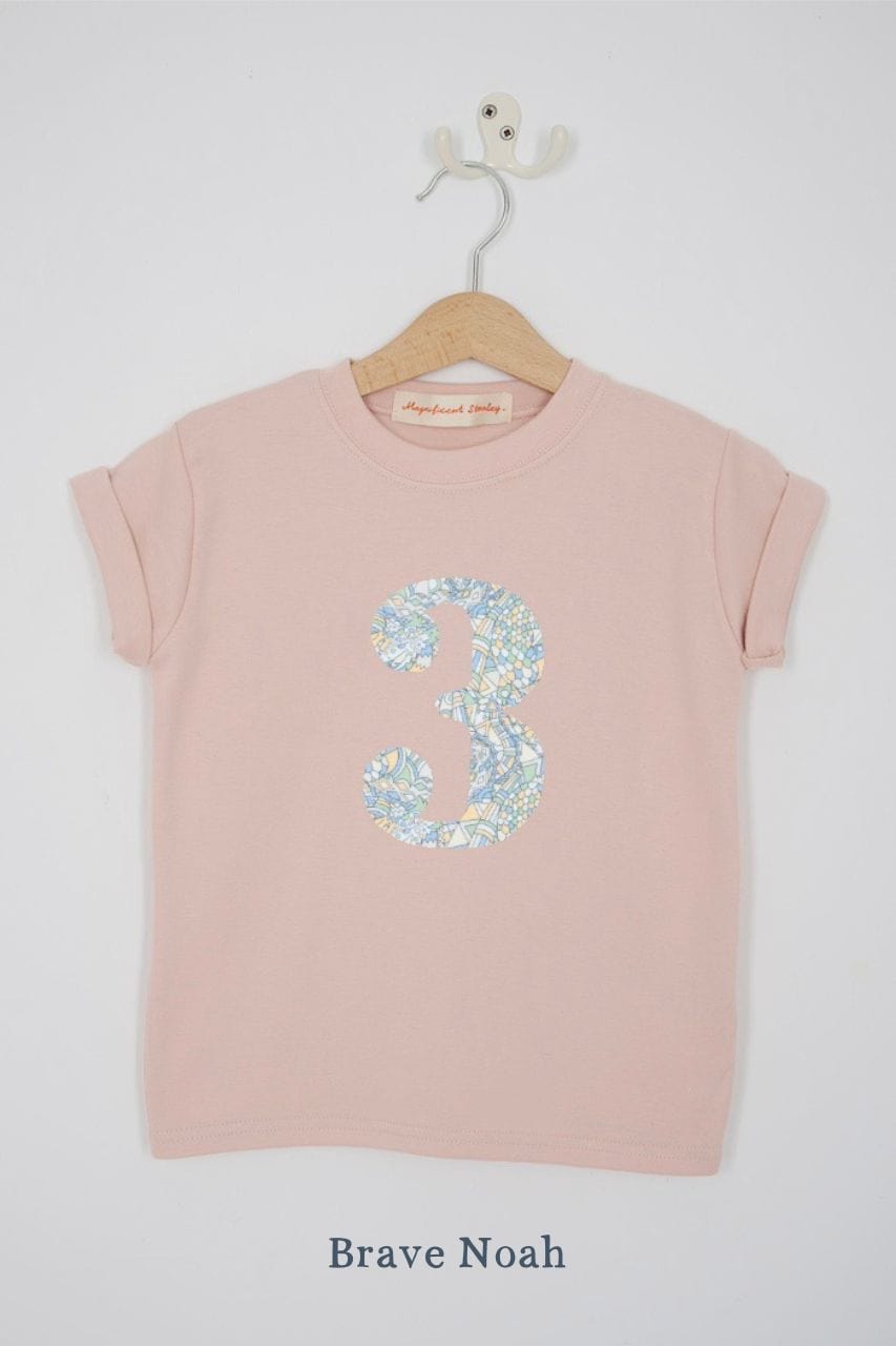 a pink 3rd birthday t-shirt with a number 3 cut from brave noah dragon print on the front