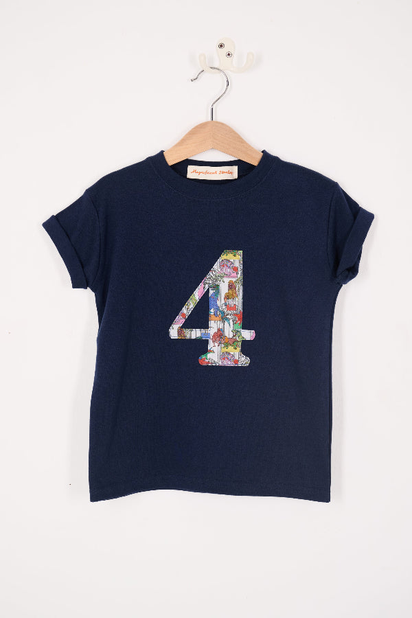 a navy kids birthday t-shirt with a colourful number 4 design in Liberty dinosaur print  on the front