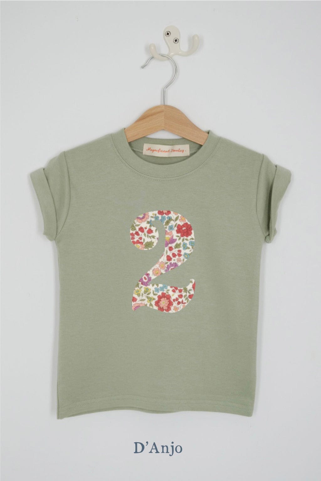 a number 2nd birthday kids sage green t-shirt with a number cut from d'anjo floral liberty print on the front.
