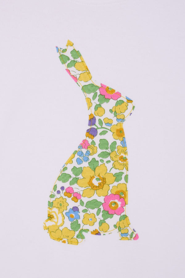 a white cotton baby bodysuit with an easter bunny made from Betsy Liberty Print sewn onto the front.