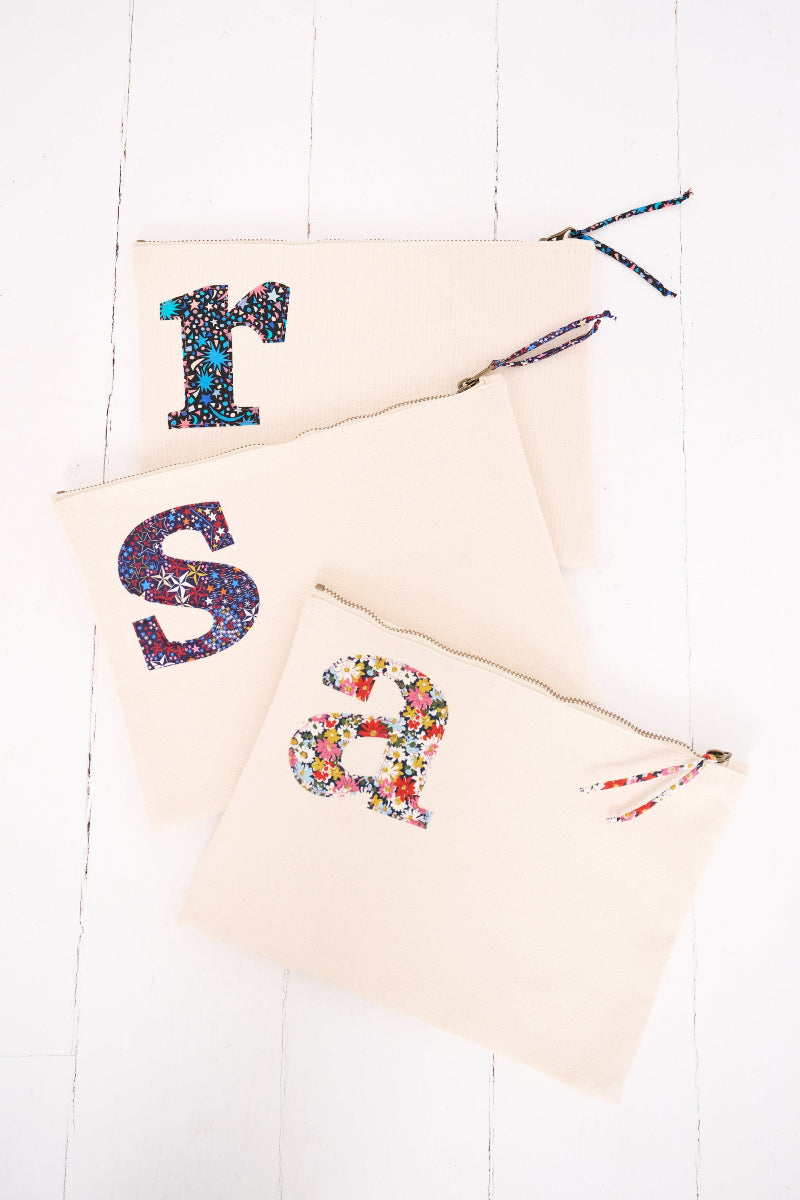 Magnificent Stanley Personalised Liberty print pouches with initials sewn on them. Teacher gifts for make up or stationery.