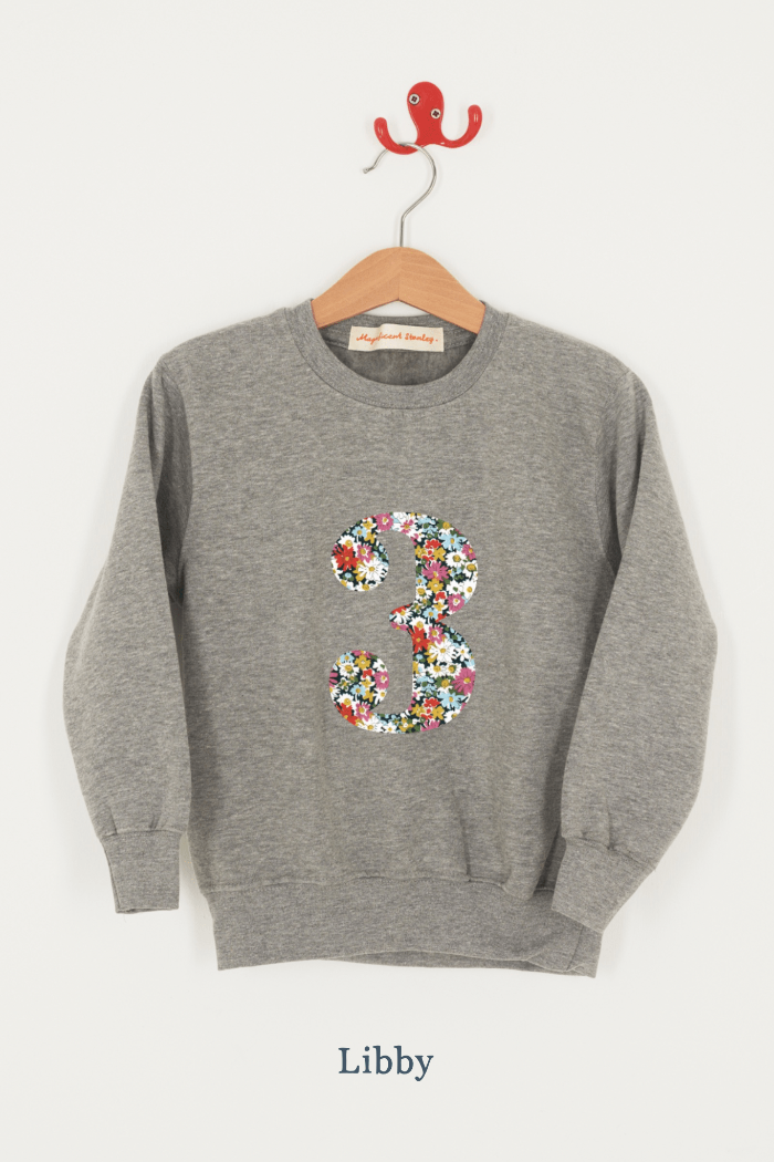 A birthday grey sweatshirt with a number 3 on in Libby floral Liberty fabric.