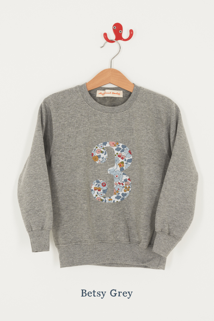 A birthday grey sweatshirt with a number 3 on in Betsy floral Liberty fabric.
