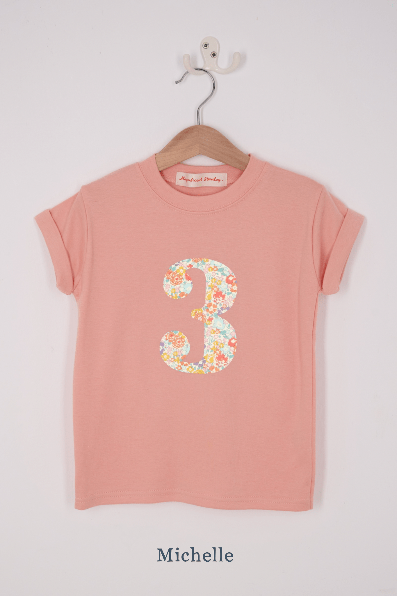 A pink birthday t-shirt with a number 3 on in Liberty floral print.